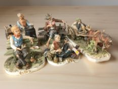 A Capodimonte figure group of a horse pulling a gentleman in a cart, width 50 cm,