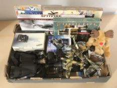 A group of die cast model aeroplanes, antique and modern binoculars, die cast cars,