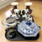 A pair of Staffordshire spaniels, pair of burgundy ground vases with twin ram's head handles,