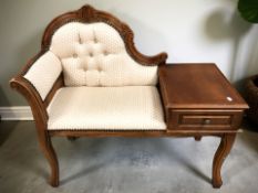 A reproduction telephone seat, length 100 cm.