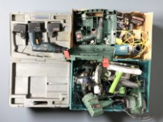 A collection of power tools including Bosch, Black & Decker, etc.