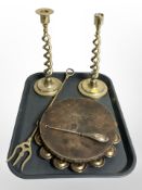 A pair of brass open barley twist candlesticks, a toasting fork,