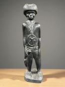 An African ebony statue of a man, height 30 cm.