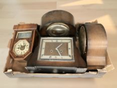 An Art Deco oak eight day mantel clock plus three further clocks