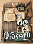 A collection of advertising mirrors, ephemera, silhouette pictures, wooden table box,