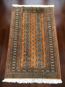 A Lahore Bokhara rug, Pakistan, 170 cm x 98 cm.