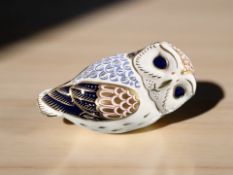 A Royal Crown Derby owl paperweight, lacking stopper.
