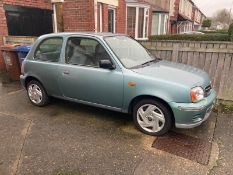 A Nissan Micra S Automatic three door hatchback motorcar, registration NL03 GUW,