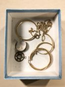 An antique rose gold ring (a/f), a pair of 9ct gold earrings, a further single earring,