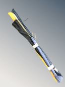 A bundle of fishing rods in cloth covers including Milbro.