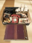 An inlaid walnut table box, miniature model boats, pair of Soviet binoculars,