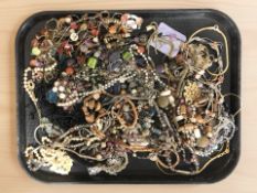 A collection of costume bead necklaces, simulated pearls, gold plated jewellery, etc.