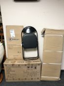 A Harbour Housewares black metal and PVC folding chair,