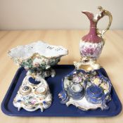 A Royal Dux porcelain ewer, two gilt porcelain desk stands and a flower encrusted bowl.
