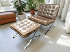 A Barcelona chair, with heavy chrome X-frame support,