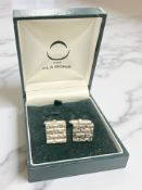A pair of Ola Gorie Scottish silver brick-textured cuff links, boxed.