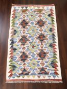 A Chobi Kilim rug, 93 cm x 64 cm.