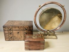 A brass and copper dinner gong with beater,