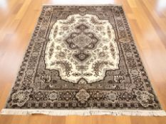 A machine-made rug of Anatolian Keyseri design, 298 cm x 207 cm.