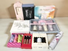 A group of boxed cosmetics, fragrances, etc.