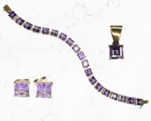 A 14ct yellow gold amethyst bracelet together with pair of earrings and pendant mounted in yellow