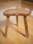 A Robert 'Mouseman' Thompson of Kilburn three legged English oak kidney-shaped stool,