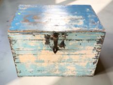 An Indian wedding box in a scumbled blue painted finish, 72 cm x 52 cm x 52 cm.