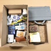 A collection of fishing equipment including fly making, landing net, scale,