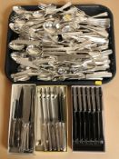 A large quantity of boxed and loose EPNS cutlery.
