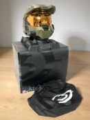 A Microsoft Games Studios Halo 3 Legendary Edition Spartan Helmet on stand with box