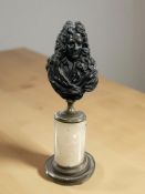 A bronze bust of a gentleman on brass mounted alabaster plinth, height 20 cm.