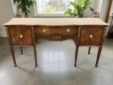 A reproduction mahogany serpentine front serving table in the George III style,