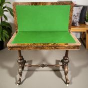 A Victorian figured walnut and satinwood inlaid turnover top card table,
