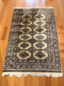 A Lahore Bokhara rug, Pakistan, 210 cm x 135 cm.