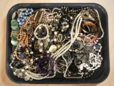 A collection of costume bead necklaces, simulated pearls, gold plated jewellery, etc.