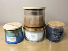 Four various scented candles,
