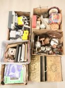 A large quantity of metal wares including brass embossed magazine racks,