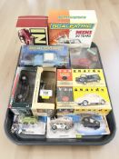 A group of boxed die cast vehicles including Scalextric, Vanguards, Corgi, etc.