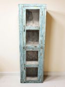 An Indian glazed double door cabinet in blue shabby-chic painted finish, 49 cm x 29 cm x 159 cm.