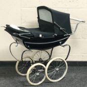 A Silver Cross pram.