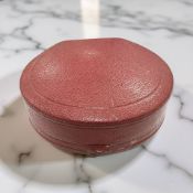 A vintage red leather Rolex watch box