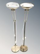 A pair of contemporary brass standard lamps.