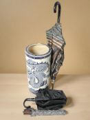 A 20th century earthenware stick pot, height 49 cm,