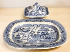 A 19th century blue and white willow pattern transfer printed meat plate and a similar tureen and