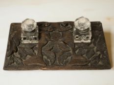 A 19th century carved oak ink stand,