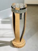 An oak wine cooler with presentation inscription, height 79 cm.