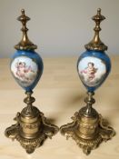 A pair of gilt metal mounted porcelain mantelpiece garnitures, height 30 cm.