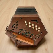 An accordion signed 'Universe,