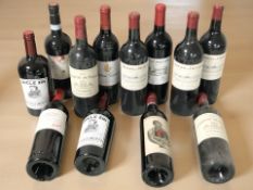 Twelve various bottles of alcohol including Uncle Zin, Domaine de Chevalier Grand Cru 2014,