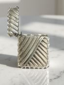 A silver vesta case with gadrooned decoration, Abraham Meyer Blanckensee, Birmingham 1892, height 3.